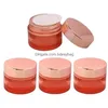 Jarro cosmético Creme de vidro rosa por atacado com tampa de ouro rosa 5g 10g 15g 20g 30g 50g 60g 100g Makeup Viagem de amostra de recipiente Garrafas Drop Dhues