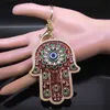 Keychains Lanyards Islam Hand of Fatima Turky Blue Eyes Keychain Lucky Eye Hamsa Hands Flower Keyring Pendant Män Kvinnor smycken Chaveiro Para Carro Y240417