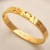 Bracelets Designer Brand Letter Imprimer Charme de fleur Bracelets Qualité Men Femmes Femmes en acier inoxydable Magnétique Bangle Luxury Gold plaqué Brown