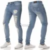 Jeans masculin printemps hommes élégants déchirés de mendiant détruit pantalon maigre masculin Hip Hop High Street Solid Jogging Crayon Denim Pantmand D240417