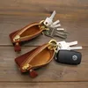 PU Lederauto Keychain Beutelmünze Geldbeutel Schlüsselbund protable Unisex Keyring -Tasche für Männer Frauen