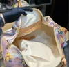 Hommes pour femmes fleurs de mode plantes imprimé sacs de voyage sac de marécage de marécage de luxe graffiti 50 cm bagages en cuir réel en cuir de grande capacité