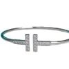 Braceuses de concepteur Tiffenny Bijoux de luxe Bracelet Double T plaqué avec une boucle ouverte de niveau de tempérament léger incrusté en or 18 carats en or 18 carats