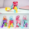 Creative cartoon color blocking cool bear keychain, exquisite female couple, car keychain pendant, student backpack pendant