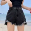 Lös version montering av bantning med hög midja denim shorts sommar mode mångsidig päls kant kryddig tjej en linje denim heta byxor