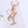 Tornari per la moda di moda 26 lettere Metal Keyring Rhinestone BASSE INIZIALE PENDANT PENDANT ACCADE ACCESSORI DI PASSORE DEGNI DI GIORNO DEGGI D240417