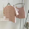 Shorts Sets 2 -delige dames outiften o nek roze tweed jas femme crop Cardigan tops Koreaanse jas kort broekpak 240412