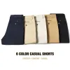 Pantaloni 6 cortometraggi casual a colori 2023 estate nuovi pantaloni corti elastici dritti pantaloni corti marchio maschio kaki beige black blu scuro