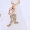 Tornari per la moda di moda 26 lettere Metal Keyring Rhinestone BASSE INIZIALE PENDANT PENDANT ACCADE ACCESSORI DI PASSORE DEGNI DI GIORNO DEGGI D240417