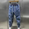 71kw jeans maschile maschile jogger casual jogger harem denim pantaloni hip hop elastica lettera di lettere jeans pantaloni maschi 2024 primavera new d240417