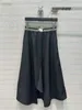 Skirts Designer Half skirt 2024 early spring new fashionable and simple irregular hem patchwork woven belt half skirt 1ANE