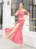 STAGE Wear Dance Dance 2PCS Set à manches courtes Top Tassel Jupe Femmes Danse Performance Suit Female Oriental Tenue