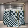 Prawidłowe Rhude Checkerboard Nerkowca kwiat American High Street Jacquard wełniane wełniane luźne swobodne spodenki dla mężczyzn