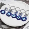 Keychains Lanyards Lucky Eye Drip Oil Turkse Evil Eye Eye Key Chain Alloy Heart Moon Star Butterfly Charm Keychain Car Keyring voor vrouwelijke mannen BE1227 Y240417