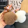 Cute Real Genuine Shearling Fur Dog Puppy Keychain Pompom Ball Bag Charm Bag Car Phone Purse Pendant Kids Doll Toys