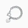 Designers européens et américains T Series 925 Bracelet de charme en argent sterling Boucles d'oreilles pour femmes Love Lock Set 18k Bracelet classique en or cadeau de bijoux classique plaqué or