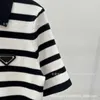 Women's Knits & Tees Designer 2024 Summer New High Edition P Contrast Stripe Metal Triangle Knitted Short Sleeve Age Reducing Academy Style T-shirt CGY5