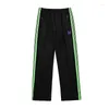 Pantalones para hombres Agujas Llegadas Pantalones de chándal Púrpura Bordado de mariposa Verde Carretera Track Stripe pantalón Zipper 1: 1 Hombres Mujeres de gran tamaño