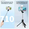 Selfie monopods Téléphone portable Sétille Trépied Bluetooth Remote sans fil Self Stick Téléphone support avec une lumière de remplissage de beauté pour le téléphone Y240418 Y281RJ