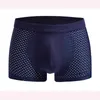 Sous-pants 4pcs / lot Summer Men's Underwear Man Boxer Ice Silk Mesh Boîtres Sexy Youth Boxer Shorts de grande taille