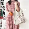 ショルダーバッグ2024女性キャンバスショッピングバッグプリント女性綿布エコハンドバッグトート再利用可能な食料品店の買い物客