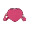 Diseñador Spring New Classic Colorful Handheld Love Bag Fashionable Popular Letter Heart en forma de malla machacada Bolsa para mujer