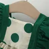 Mädchenkleider 2-teiliger Sommer-Baby-Baumwollkleid und Hut mit ausgehöhlten Spitzenpolk-Dot-ärmellose koreanische Version