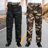 Pantalon pour hommes à crampons de camouflage élastique imprimement épais en peluche chaude décontractée de ruban de coiffeur de file d'attente extérieure