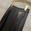 Jupes 24 mi-jupe de printemps SUMPER SUPER BELLE BEAU BLACK POD Design devant deux coupes plissées non usé.13