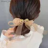 Haarrubberbanden 2022 Nieuwe elegante organza -golvende rubberen bands Haaraccessoires Elastische band Haar touw Strijnwinning voor Bow Girl Women Hoofdbanden Y240417