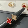 High-End-Schmuckringe für Vancleff Womens New Laser Red Chalcedony Clover/Fliped Ring 18k Doppelblum