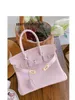 Kvinnor Luxury Handbag L 2024 Nytt trendigt lager Cowhide och Lychee Mönster Bag äkta läder Womens Handväska Single Shoulder Crossbody Bag Qii7