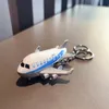 Cartoon Creative Small Aircraft Alloy Toy Keychain Car Pendant Stationery Shop dockmaskin Små smycken Små hänge