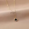 Four Leaf Clover Black and White Dual Color Full Diamond Necklace for Women in 2024, New Trendy and Fashionable Collarbone Chain Titanium Steel Necklace 779