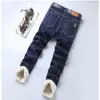 Jeans masculinos de lã de lã de inverno lã de veludo espessou a reta de calça térmica de jeans de jeans casual da faixa