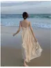 カジュアルドレス2024女性の夏のファッションスリップドレスノースリーブVネックマルチレイヤーフリルミニリゾートビーチの衣装