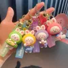 本物のクリエイティブなかわいい小さなウサギ人形キーチェーン女性かわいいガールフレンド漫画バッグ小さなペンダントカーペンダント