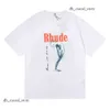 Primavera de verano Rhude T Shirt Man T Shirts Women Tees Skateboard Men de gran tamaño Camiseta de manga corta Camisetas de lujo para hombres US Tamaño S-XXL 101