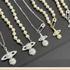 Pinzircon Anhänger Saturn Halskette für Frauen Gold Mens Kette Exquisites luxuriöser Planet Pin Halskette Mode Diamant eingelegt 925245X
