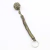 Utomhusnyckelkedja Emergency Survival Protecing Monkey Camping Lanyard Bearing Paracord Steel Parachute Ball Fist