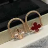 High-End Luxury Ring Fanjia High Board Clover Dubbelsidig blommor Red Agate Laser Ring for Women 18K Rose Gold vände