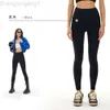 Desginer Alooo YogaAloePantレギンス2023新しい女性ファッショントレンドヌードスポーツフィットネスパンツハイウエストリフティングヒップタイツ
