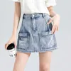 Sommarkjolbyxor Kontrast Färg Korean elastisk fri denimstil Hög midja inslagna höft A-line shorts 3/4 för flickor