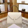 2024 Top Women's Sac à bandoulière Sac en cuir Niche Design Fashion Simple Locking Hand Bill of Lading Boulling Oblique Span Women's Bag grande capacité