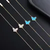 Brand Charm v Golden Van Clover Butterfly Armband Womens White Beimu Ke Blue Turquoise Elegant smycken Högkvalitativ skattparti med logotyp