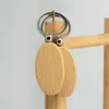 Keychains 100pcs Keychian en bois vide pour peindre pour l'artisanat