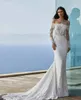 2024 Abiti da sposa moderni a spalla sirene per la sirena a maniche lunghe in pizzo appliqued Beach Boho Bridaltrain Vestidos YD