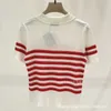 Kvinnors stickor Tees Designer 2024 Summer Ny högversion Letter Jacquard Contrast Stripe Polo Neck mode mångsidig stickad kortärmad kvinnor v7nk