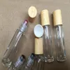 Depolama şişeleri 100pcs 10ml boş mücevher silindir şeffaf kalın esansiyel yağ cam şişe taş yeşim kristal plastik kapak