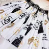 Conjuntos de ropa Summer Corea Corea Instagram Super Linda Marca de manga corta Falda plisada Media falda Juego de dos piezas para niñas Mid o Large Children 1 Q240417